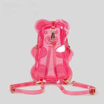Load image into Gallery viewer, Pink jelly backpack with a strap on a light gray background
