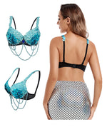 Load image into Gallery viewer, Woman wearing a turquoise floral bikini with black straps on a white background
