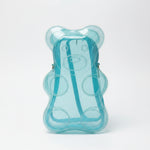 Load image into Gallery viewer, Clear plastic phone case with blue tulle held by a hand on a dark background
